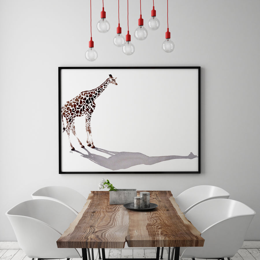 Large scale giraffe watercolour painting framed above a modern dining table.